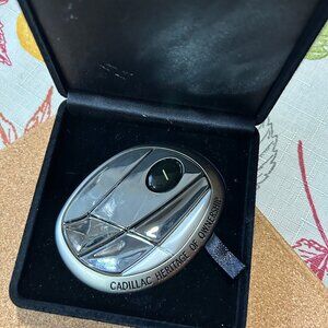 CADILLAC HERITAGE  OF OWERNSHIP MEDALION